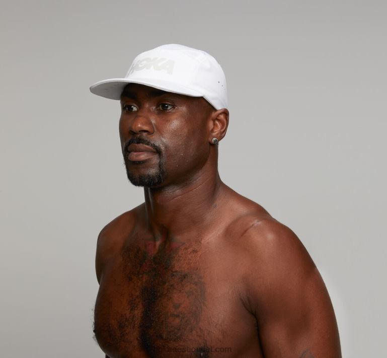 naised Hoka esinemismüts 6ZBF396 valge/jahe hall